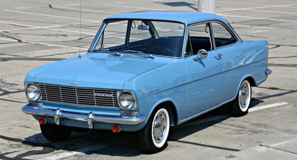 Vintage AMS Review: How the 1964 German Cars Accelerate – Including the New Porsche 911 4 Front 3q view of a blue 1964 Opel Kadett S coupe