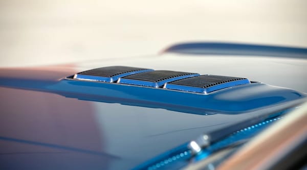 Vintage Car Life Review: 1967 Chevrolet Impala SS 427 – "A Family Car For A Swinging Family" 9 SS 427 chrome hood decoration on a Marina Blue 1967 Chevrolet Impala SS 427