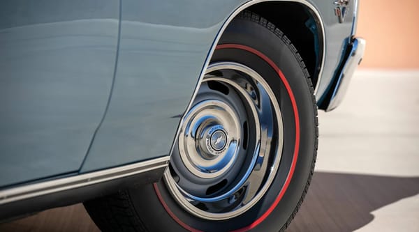 Vintage Car Life Review: 1967 Chevrolet Impala SS 427 – "A Family Car For A Swinging Family" 13 Redline tire and 15-inch rally wheel on a Marina Blue 1967 Chevrolet Impala SS427