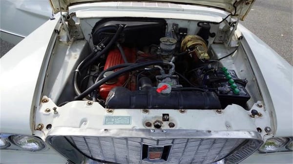 Vintage R&T Review: 1960 Valiant — A Technical Analysis Of Chrysler's New Compact 18 Chrysler 170 Slant Six engine under the hood of a white 1960 Valiant