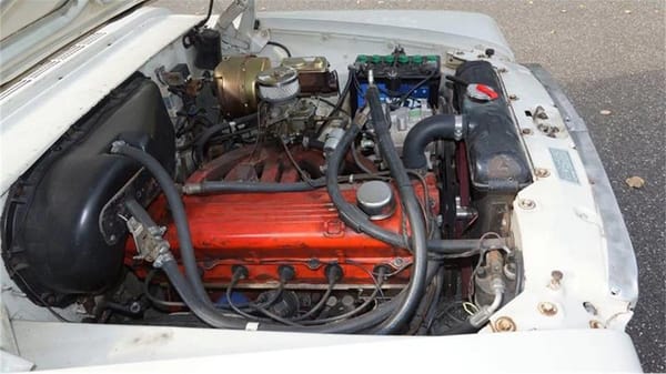 Vintage R&T Review: 1960 Valiant — A Technical Analysis Of Chrysler's New Compact 21 Chrysler 170 Slant Six engine, with non-stock carburetor air cleaner, under the hood of a white 1960 Valiant