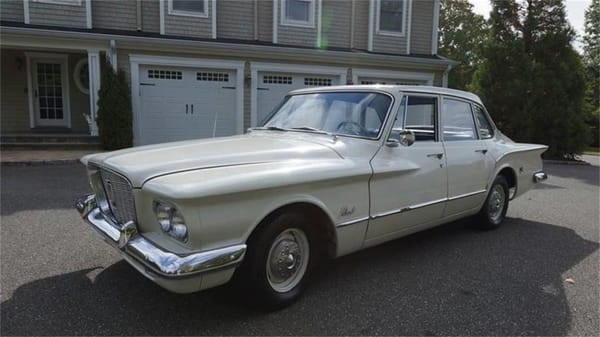 Vintage R&T Review: 1960 Valiant — A Technical Analysis Of Chrysler's New Compact 8 Left front 3q view of a white 1960 Valiant four-door sedan