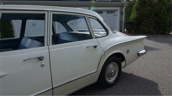 Vintage R&T Review: 1960 Valiant — A Technical Analysis Of Chrysler's New Compact 12 Left rear fender of a white 1960 Valiant V200 sedan