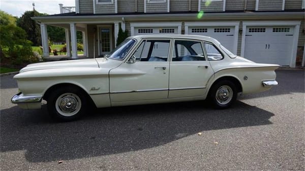 Vintage R&T Review: 1960 Valiant — A Technical Analysis Of Chrysler's New Compact 4 Left side view of a white 1960 Valiant four-door sedan