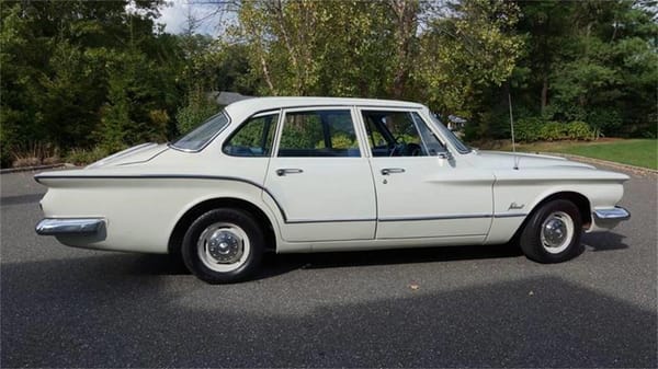 Vintage R&T Review: 1960 Valiant — A Technical Analysis Of Chrysler's New Compact 24 Right side view of a white 1960 Valiant sedan