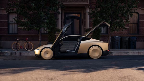 Tesla's Cybercab Robotaxi Raises Many Questions Including Why It Has Bigger Wheels On The Back Than The Front 4 Tesla Robotaxi with Butteryfly Doors Open