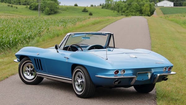 Vintage M/T Review: 1965 Chevrolet Corvette Sting Ray Convertible – A Walk On The Mild(er) Side 15 Rear 3q view of a Nassau Blue 1965 Chevrolet Corvette Sting Ray convertible with the top down