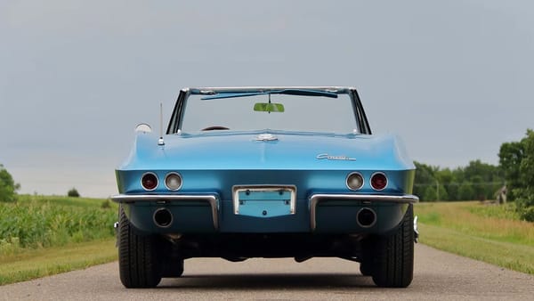 Vintage M/T Review: 1965 Chevrolet Corvette Sting Ray Convertible – A Walk On The Mild(er) Side 22 Rear view of a Nassau Blue 1965 Chevrolet Corvette Sting Ray convertible with the top down