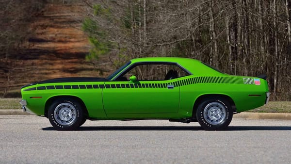 Two Dozen Green Cars And Trucks To Mark The Start of Spring 1 Left side view of a Sassy Grass Green 1970 Plymouth AAR 'Cuda