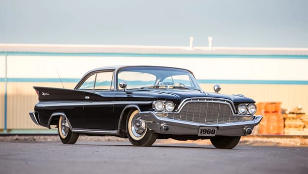 Right front 3q view of a black 1960 DeSoto Adventurer two-door hardtop with a white roof