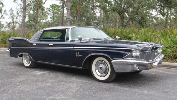 Right front 3q view of a dark blue 1960 Imperial Le Baron four-door hardtop
