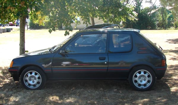 Car Show Classics: At The Chappelle de Vehicules Anciennes At Tonneins, France, For The Fete Of Saint Christopher. 20 205gti