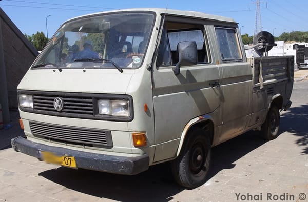 Grey Volkswagen T3 Crew Cab Pickup