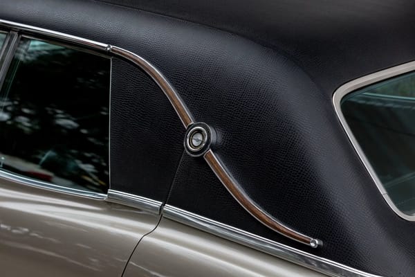 1968 Ford Thunderbird Versus Rivals – How Ford Ranked The T-Bird's Competition 42 Vinyl roof and landau iron (with woodgrain insert) on the left sail panel of a Pewter Mist 1968 Ford Thunderbird 4-Door Landau