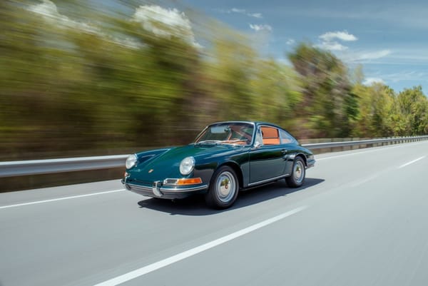 Vintage AMS Review: How the 1964 German Cars Accelerate – Including the New Porsche 911 1 Green 1965 Porsche 911 in motion on the highway