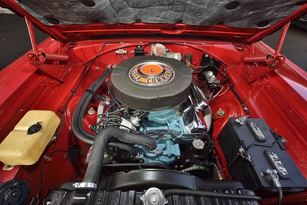 Chrysler Super Commando 440 engine under the hood of a Bright Red 1967 Plymouth GTX