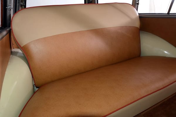 1950 Nash Rambler Custom Station Wagon – The Original Luxury Compact Turns 75 12 Back seat of a 1950 Nash Rambler with two-tone leatherette upholstery in tan and orange
