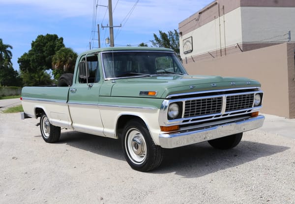 Two Dozen Green Cars And Trucks To Mark The Start of Spring 21 Front view of a two-tone Boxwood Green over white 1970 Ford F-100 Sport Custom Styleside pickup