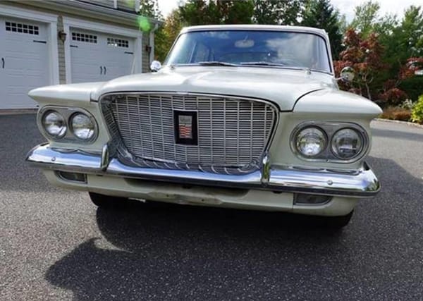 Vintage R&T Review: 1960 Valiant — A Technical Analysis Of Chrysler's New Compact 10 Head-on view of a white 1960 Valiant sedan