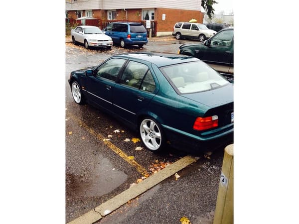 COAL: 1998 BMW 318i and 1995 Mazda Miata - My Current Rides 2 My car from the back end. I still say its one of the best BMW designs ever!