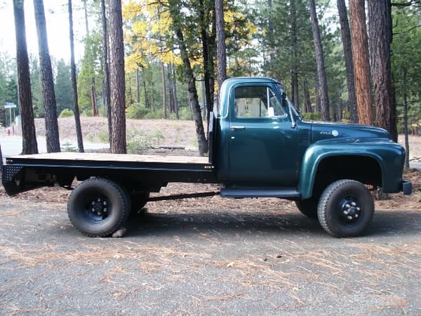 1955 Ford F-350 Dually Fabco 4-wheel-drive conversion, side view. Raised frame and special front axles visible