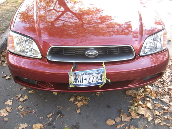 repairedfrontenddamage2013ruinedlicenseplate