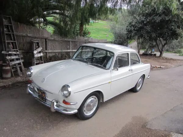Vintage AMS Review: How the 1964 German Cars Accelerate – Including the New Porsche 911 5 High front 3q view of a white VW 1500S Deluxe notchback