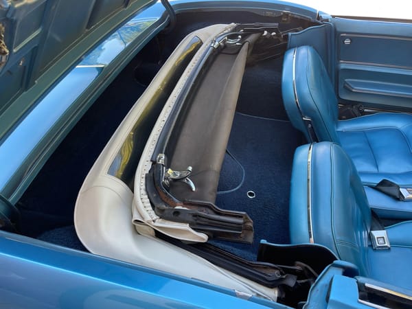 Vintage M/T Review: 1965 Chevrolet Corvette Sting Ray Convertible – A Walk On The Mild(er) Side 19 Top well of a Nassau Blue 1965 Chevrolet Corvette Sting Ray convertible with the top down