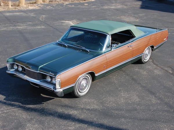 Two Dozen Green Cars And Trucks To Mark The Start of Spring 25 High front 3q view of an Augusta Green 1968 Mercury Park Lane convertible with woodgrain side trim