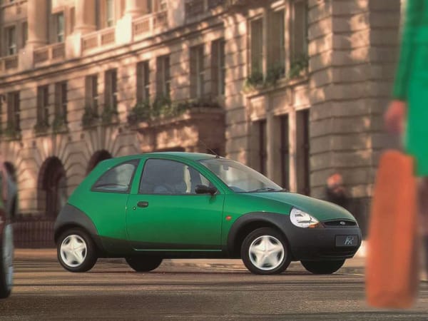 Two Dozen Green Cars And Trucks To Mark The Start of Spring 19 Brochure image of an Electric Green 1998 Ford Ka2 on a European street
