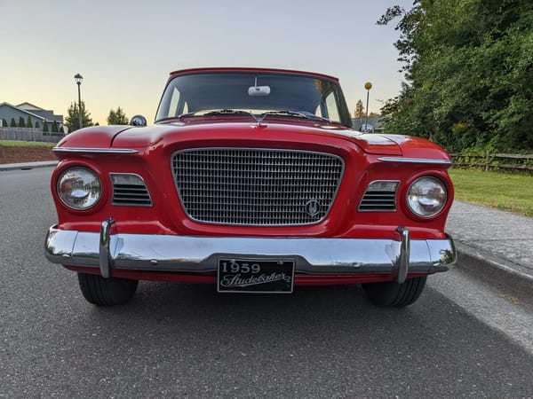 Vintage R&T Review: 1960 Valiant — A Technical Analysis Of Chrysler's New Compact 9 Front view of a red 1959 Studebaker Lark
