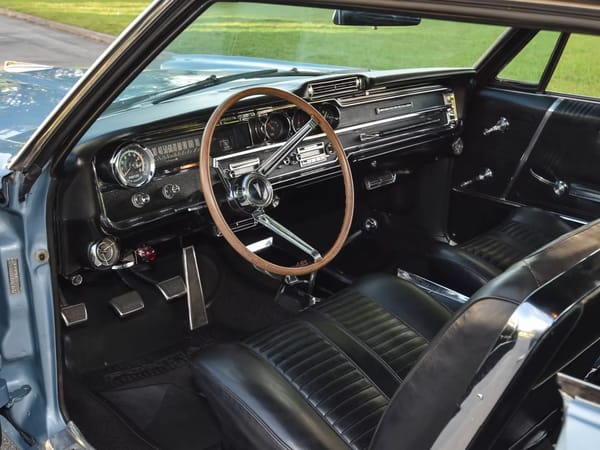 Vintage Car Life Review: 1965 Pontiac Catalina 2+2 421 HO – 2 Plus 2 Does Not Equal GTO 8 Dashboard of a 1965 Pontiac Catalina 2+2 with black vinyl upholstery, 4-speed, tachometer, and Custom Sports steering wheel
