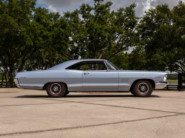 Vintage Car Life Review: 1965 Pontiac Catalina 2+2 421 HO – 2 Plus 2 Does Not Equal GTO 22 Right side view of a Fontaine Blue 1965 Pontiac Catalina 2+2 hardtop
