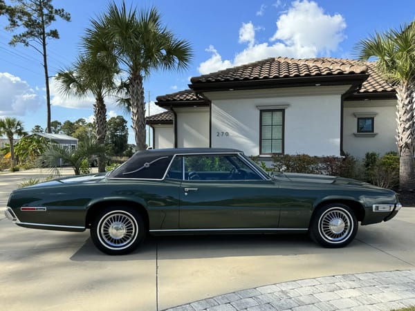 1968 Ford Thunderbird Versus Rivals – How Ford Ranked The T-Bird's Competition 43 Right side view of a Highland Green 1968 Ford Thunderbird 2-Door Landau with palm trees in the background