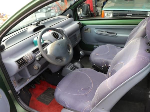 Importing My 1996 Renault Twingo Home: Five Weeks, One Tiny Renault and a Lot of Second-Guessing 4 1996 Renault Twingo interior shot with a Fiat Panda in the background.