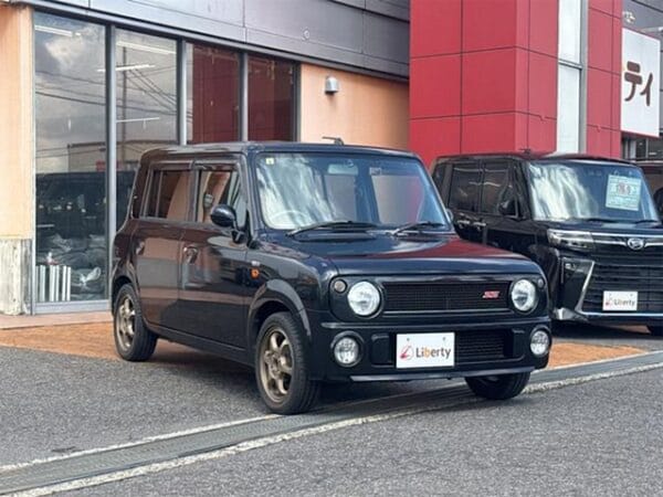 Suzuki Alto Lapin SS at dealership in Japan.