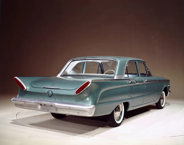 Studio rear 3q shot of a turquoise 1960 Comet four-door sedan