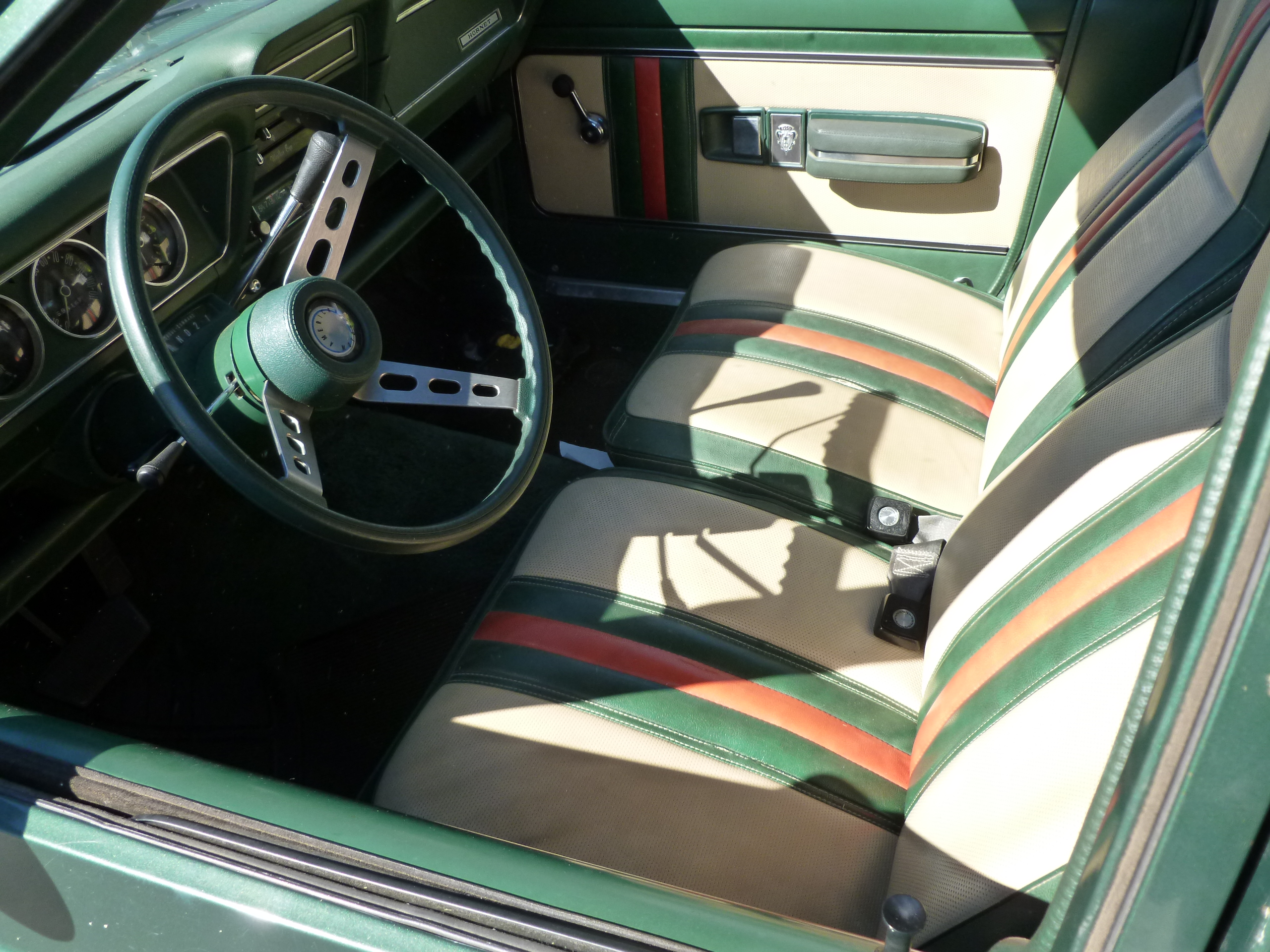 Interior pic, showing the factory sport wheel, and rare optional "tilt...