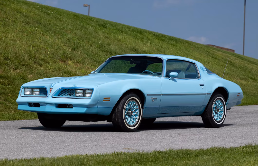 1978 Pontiac Firebird Esprit Sky Bird: A No-Reserve Chance To Own A Cosmetically Restored Museum Car 1 Driver front 3q view of blue 1978 Pontiac Firebird Esprit Sky Bird in front of grassy hill