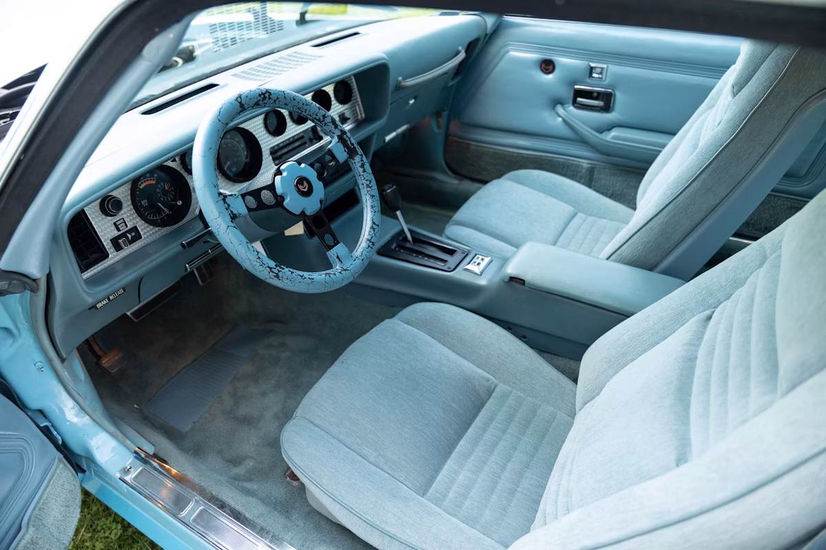 1978 Pontiac Firebird Esprit Sky Bird: A No-Reserve Chance To Own A Cosmetically Restored Museum Car 3 Blue velour interior of 1978 Pontiac Firebird Sky Bird