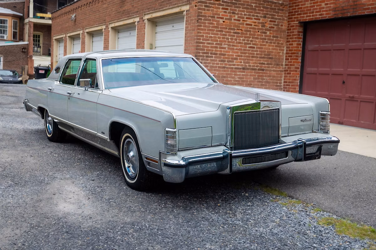 1979 Lincoln Continental Town Car: A 14,500-Mile Original Owned By The Same Family For 45 Years 1 Passenger front 3q picture of gray 1979 Lincoln Continental Town Car in front of a brick building