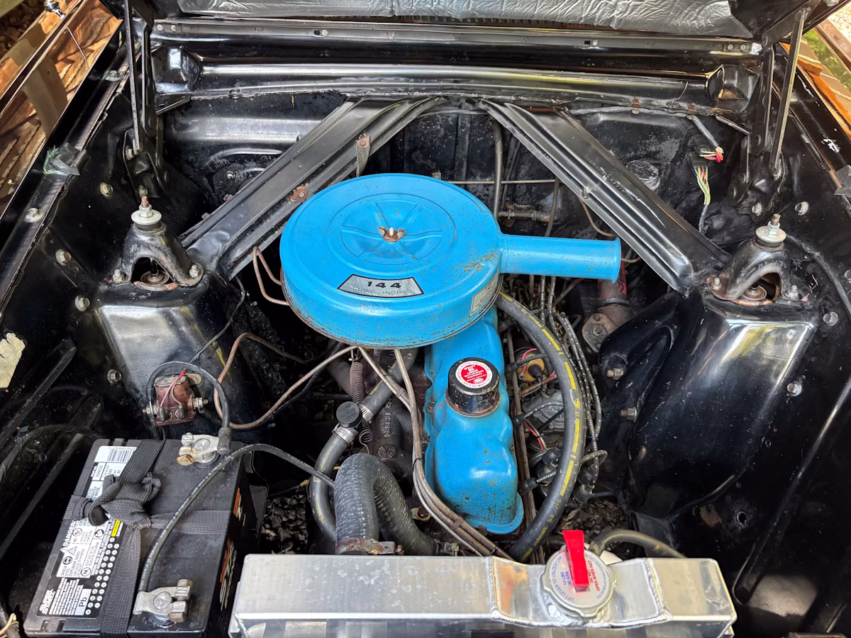 1962 Ford Falcon Futura: A Well-Documented, One-Option Falcon With A 144/Fordomatic 4 Engine compartment of black 1962 Ford Falcon Futura with 144-cubic-inch six-cylinder engine
