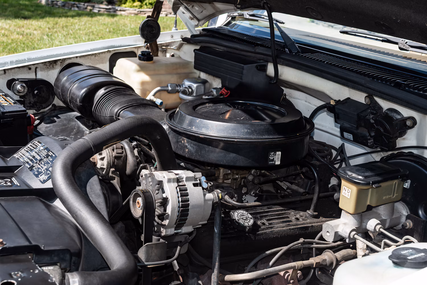 1988 Chevrolet K1500 Silverado: An All-New "Aero" Truck After 15 Years Of Squarebodies 4 Engine compartment of 1988 Chevrolet K1500 Silverado with 350-cubic-inch engine